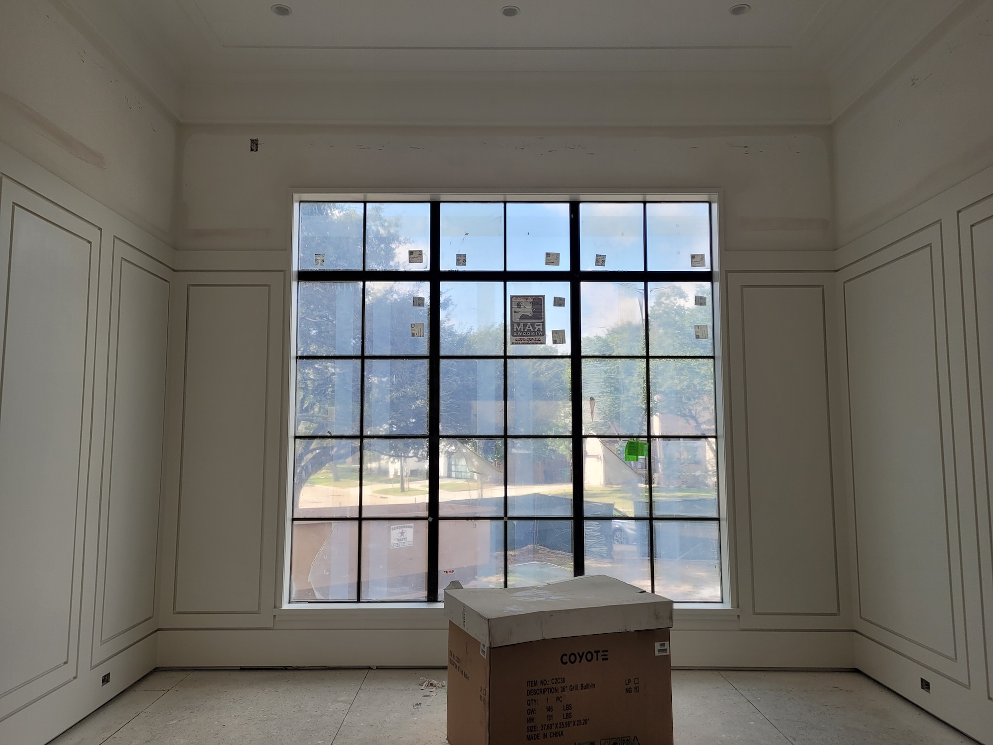 Large Wall Of Sheer Draperies In Dining Room